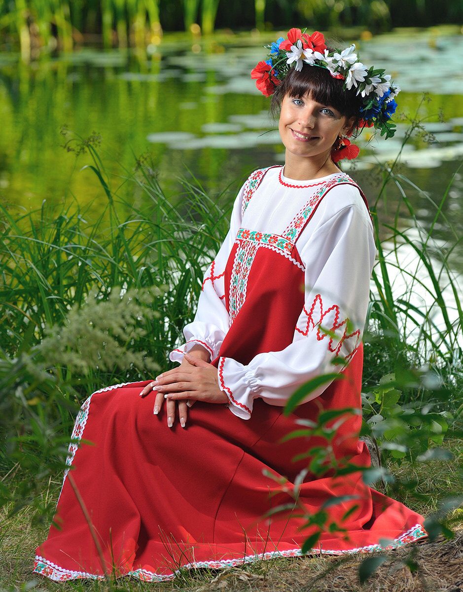 Beautiful girl Girls in Slavic costumes in Maua